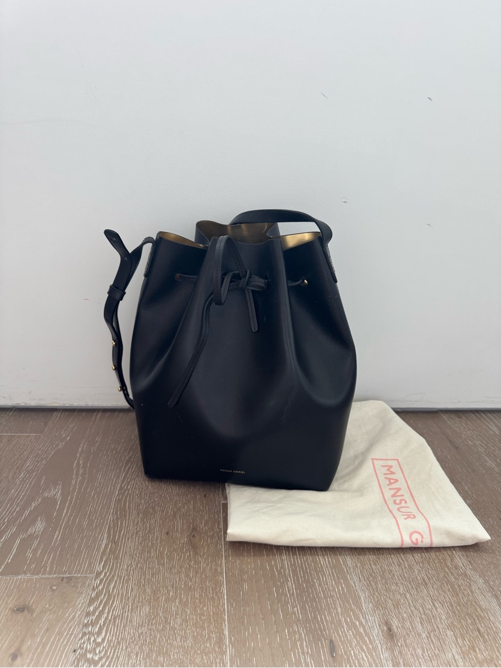 Mansur Gavriel Black Leather Drawstring Bucket Bag with Gold Trim